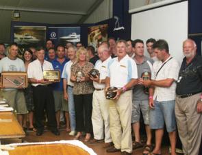 Teams from the Newcastle and Port Stephens Game Fish Club celebrate their overall win in the tag-and-release category of the NSW Interclub tournament.